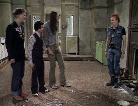 Screengrab from Young Ones episode Cash