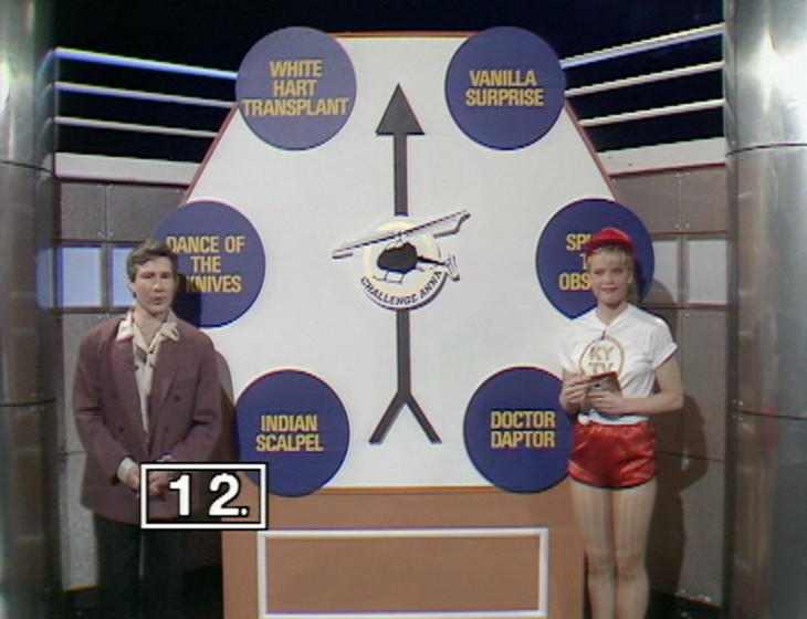 Mike Flex and Debbie spin the wheel
