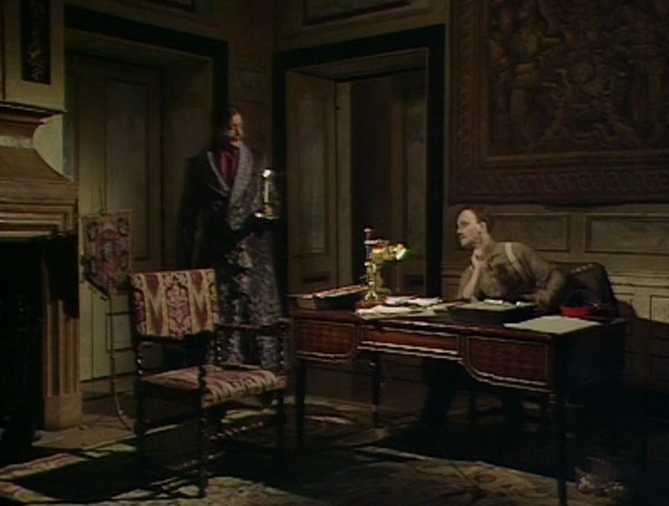Melchett and Darling in Melchett's office. Tapestry visible.
