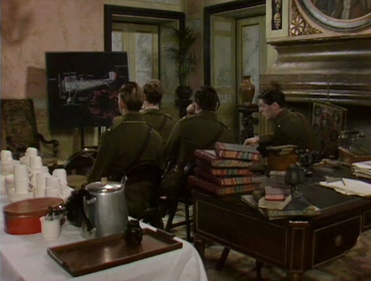 Flashheart's flight school, with the circular portrait and fireplace visible