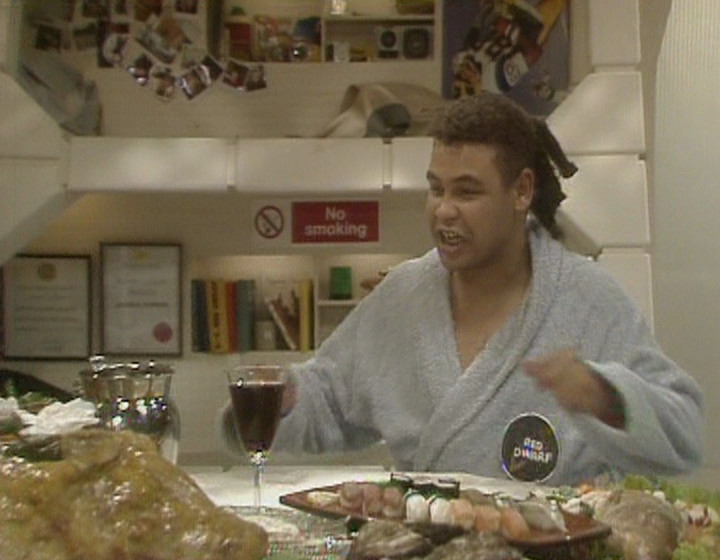 Rimmer as Lister about to tuck in