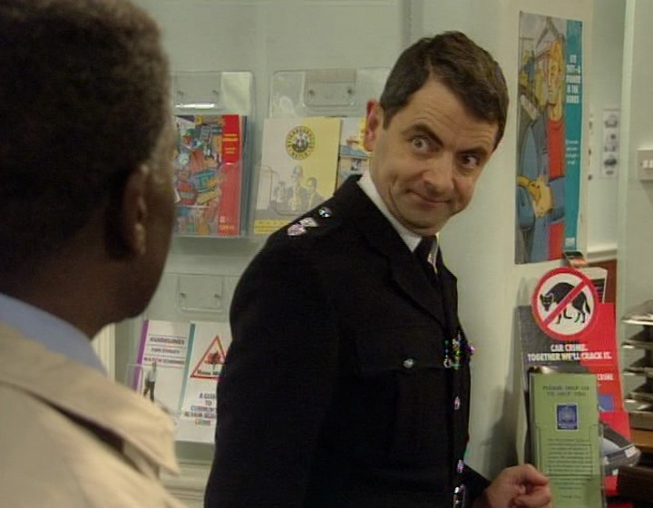 Inspector Fowler looking smug