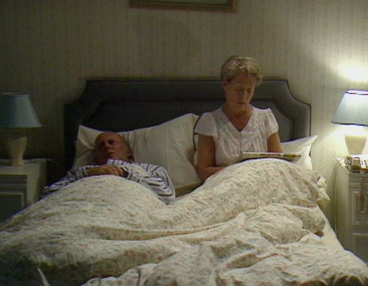 Victor and Margaret in bed from Timeless Time, light on