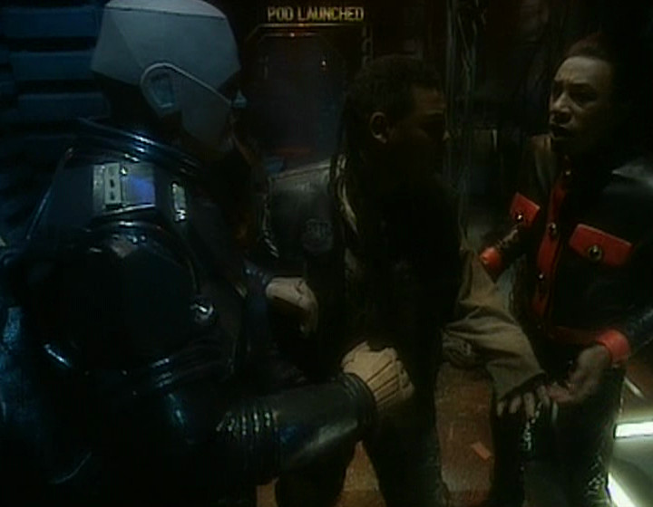 Kryten, Lister and Cat with corridor in background