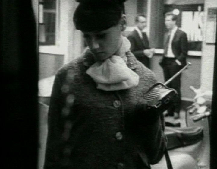 Fashionable woman listening to portable radio