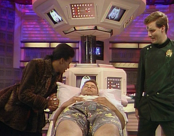 Red Dwarf control room/drive room, with Cat, Lister and Rimmer