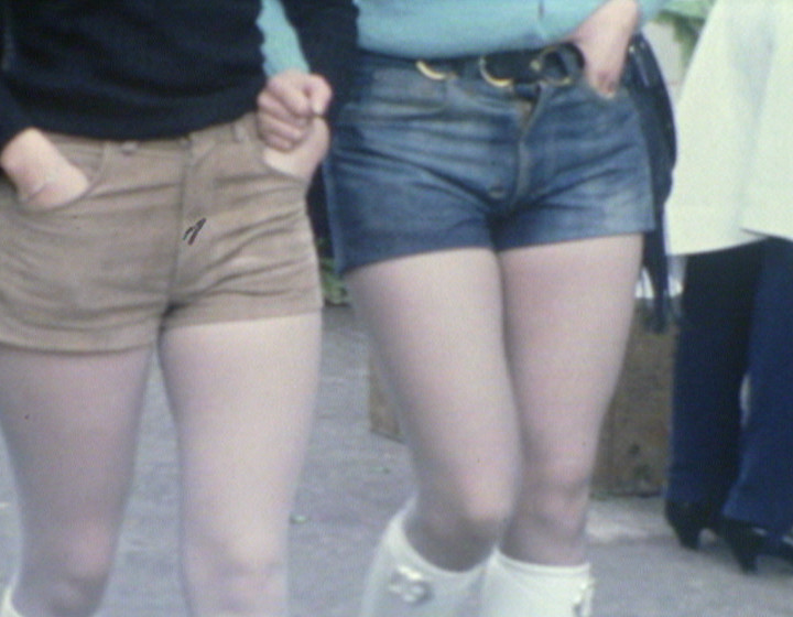 Two women wearing shorts