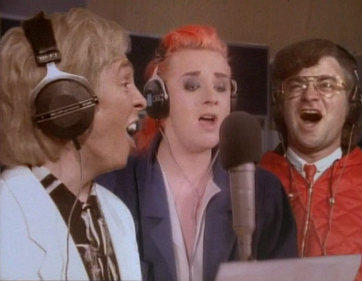 Boy George singing, with added Smashie and Nicey