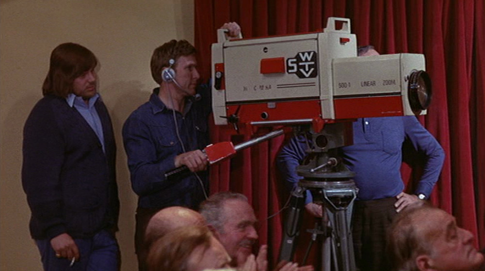 Carry on Girls: A detailed shot of the red and cream camera