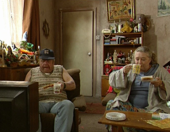 Daisy and Onslow's living room - random things on bottom shelf