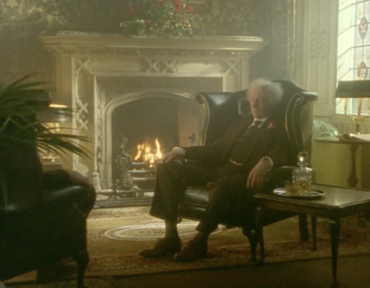 Rowley Birkin in his chair in his study