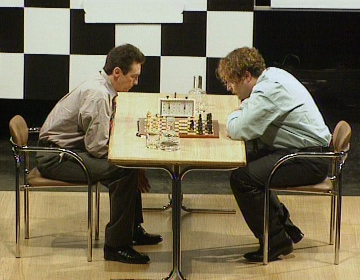 Paul Whitehouse as Brian playing chess against a character played by John Thomson