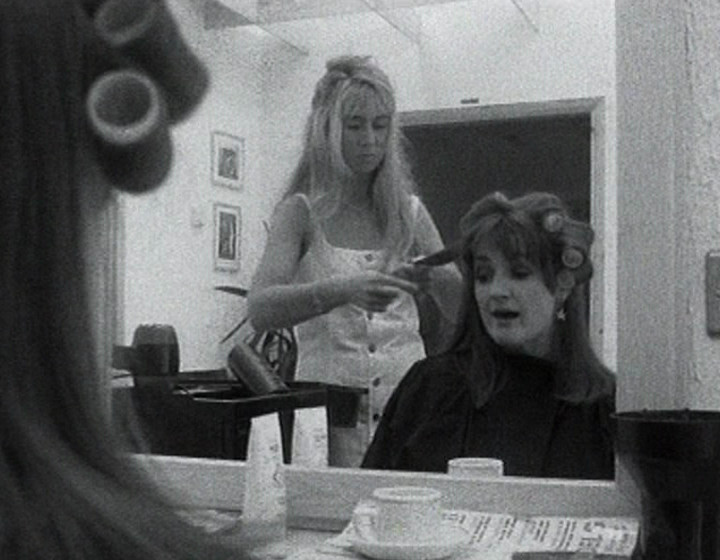 Caroline Aherne as Janine, getting her hair done