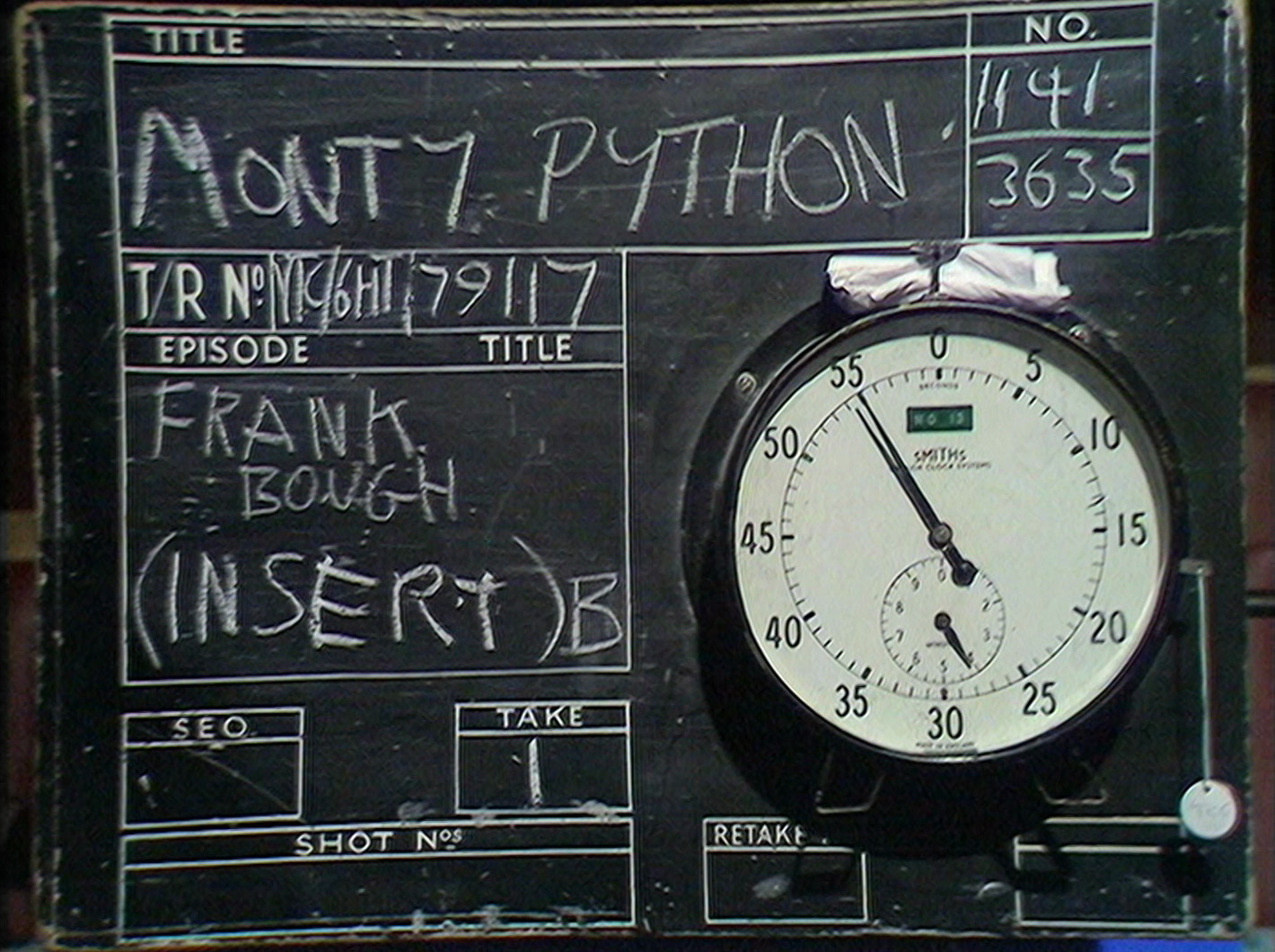 A chalkboard VT clock for a Monty Python insert