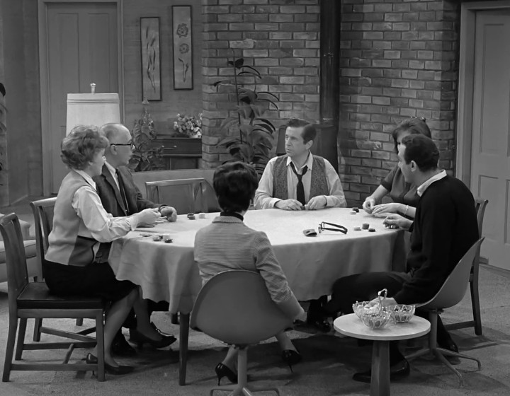 Dick Van Dyke and the gang sitting round a table